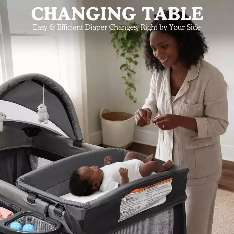 Polyester 4-in-1 Portable Playard with Bassinet, Changing Table, and Canopy
