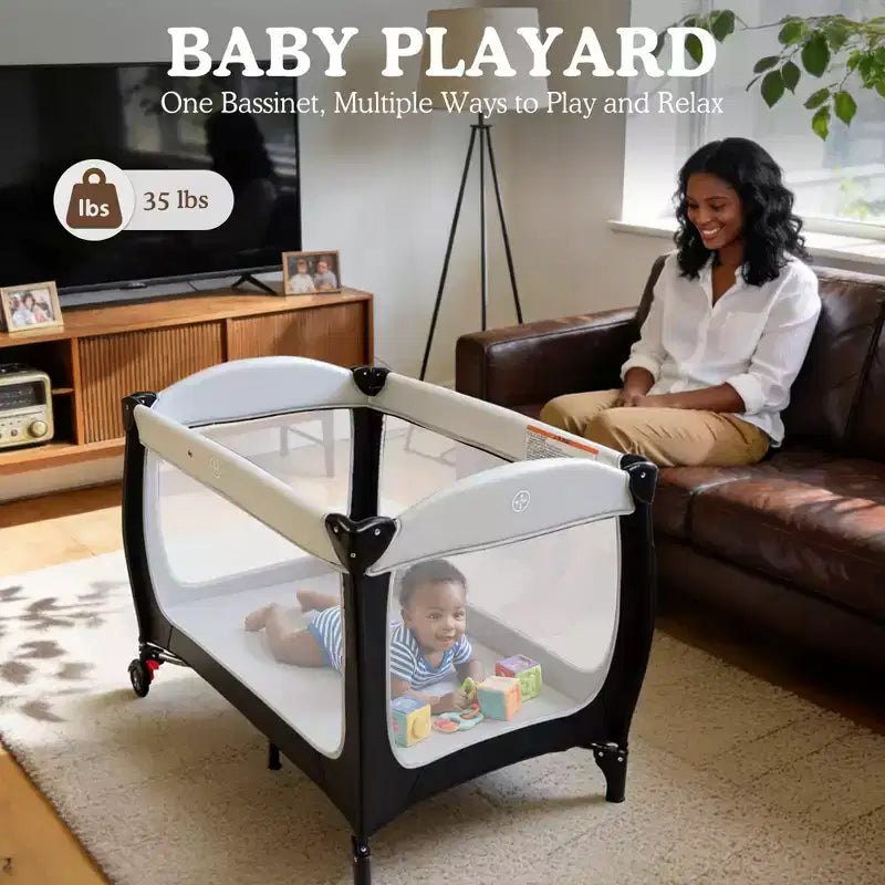 Polyester 4-in-1 Portable Playard with Bassinet, Changing Table, and Canopy